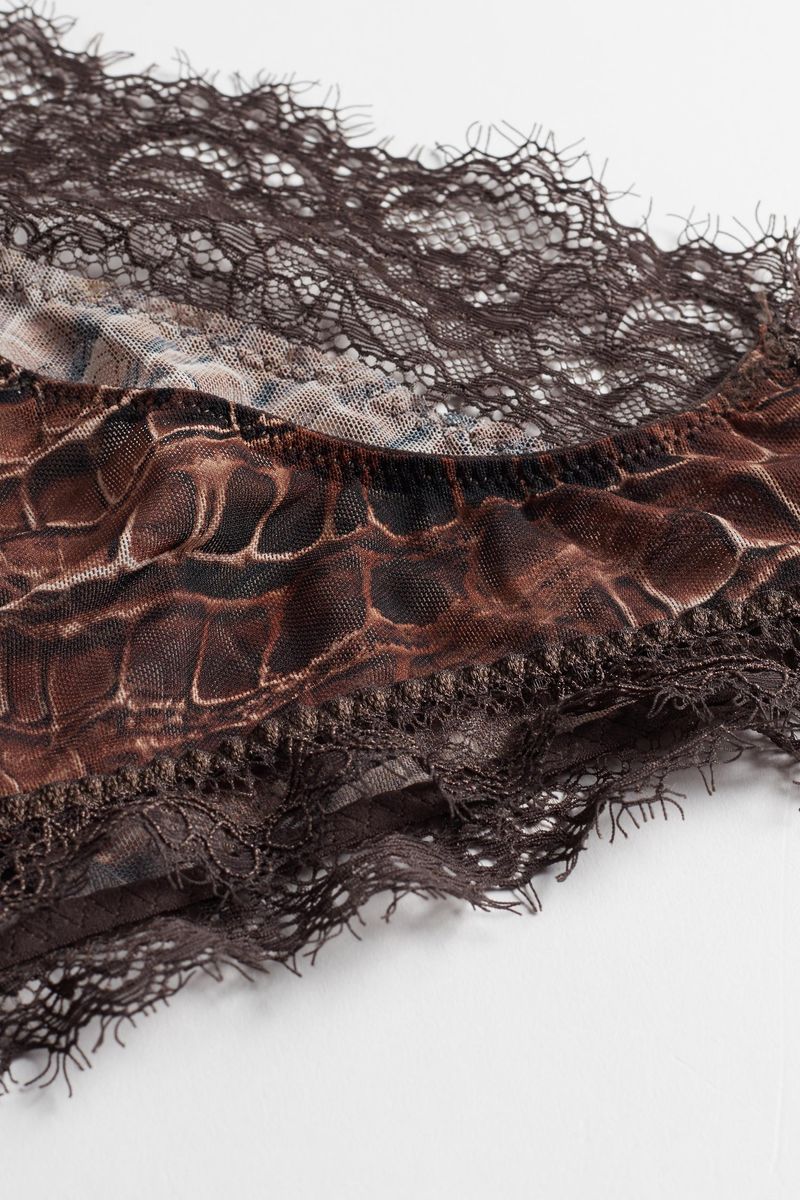 SID1353_268I_8-CUECAS-LADY-CROCODILE