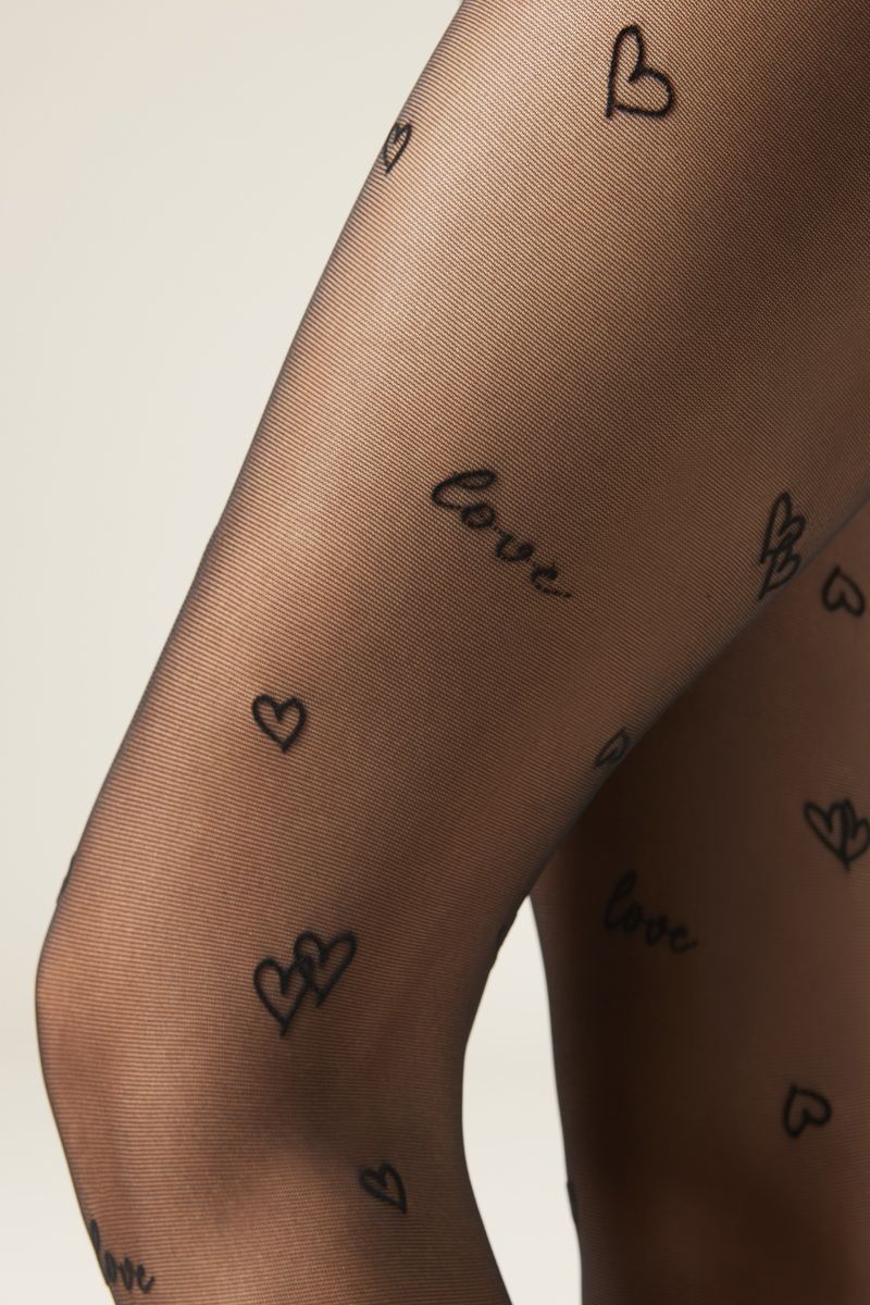 MODC2139_5231_V3_6-MEIA-CALCA-TRANSPARENTE-COM-CARACOES-E-LOVE
